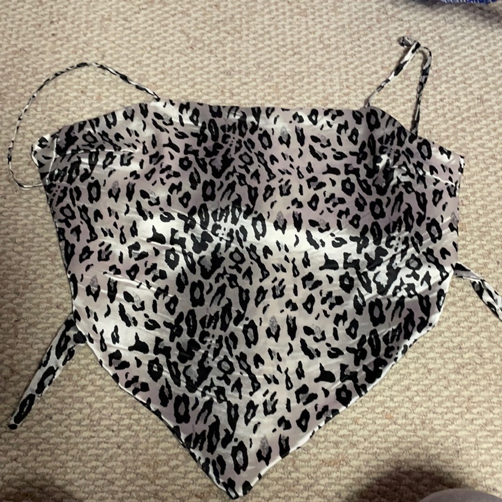 I am selling a cheetah print tank top tie up